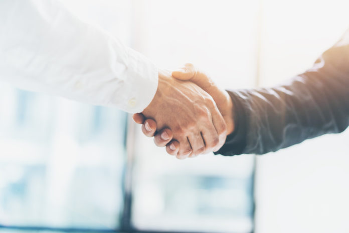 Business partnership meeting. Picture businessmans handshake. Successful businessmen handshaking after