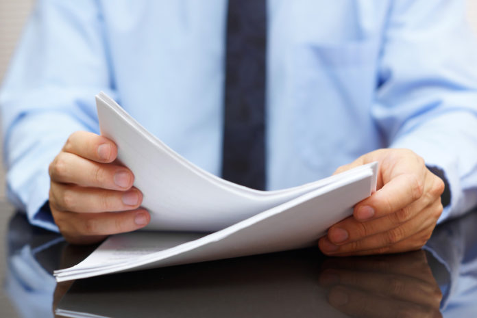 auditor is reading ducumentation