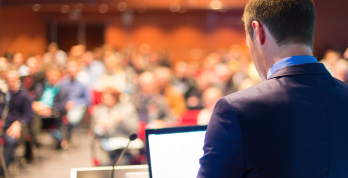 Public speaker at Business Conference.