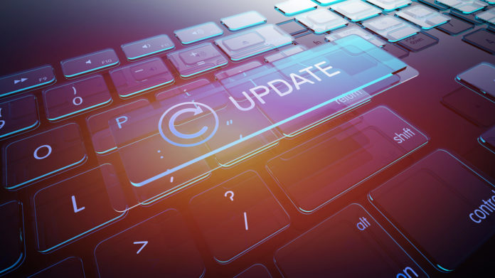 Update Button on Computer Glass Keyboard