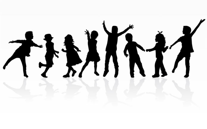 Dancing children silhouettes.