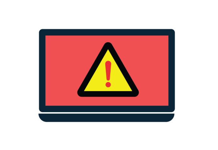 laptop computer with alert symbol