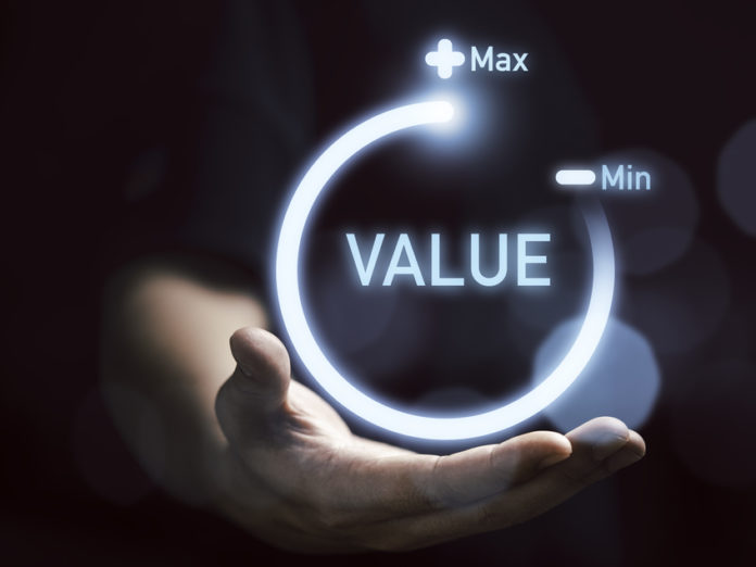 Businessman holding virtual download icon progress for increasing value added to business product and service concept.