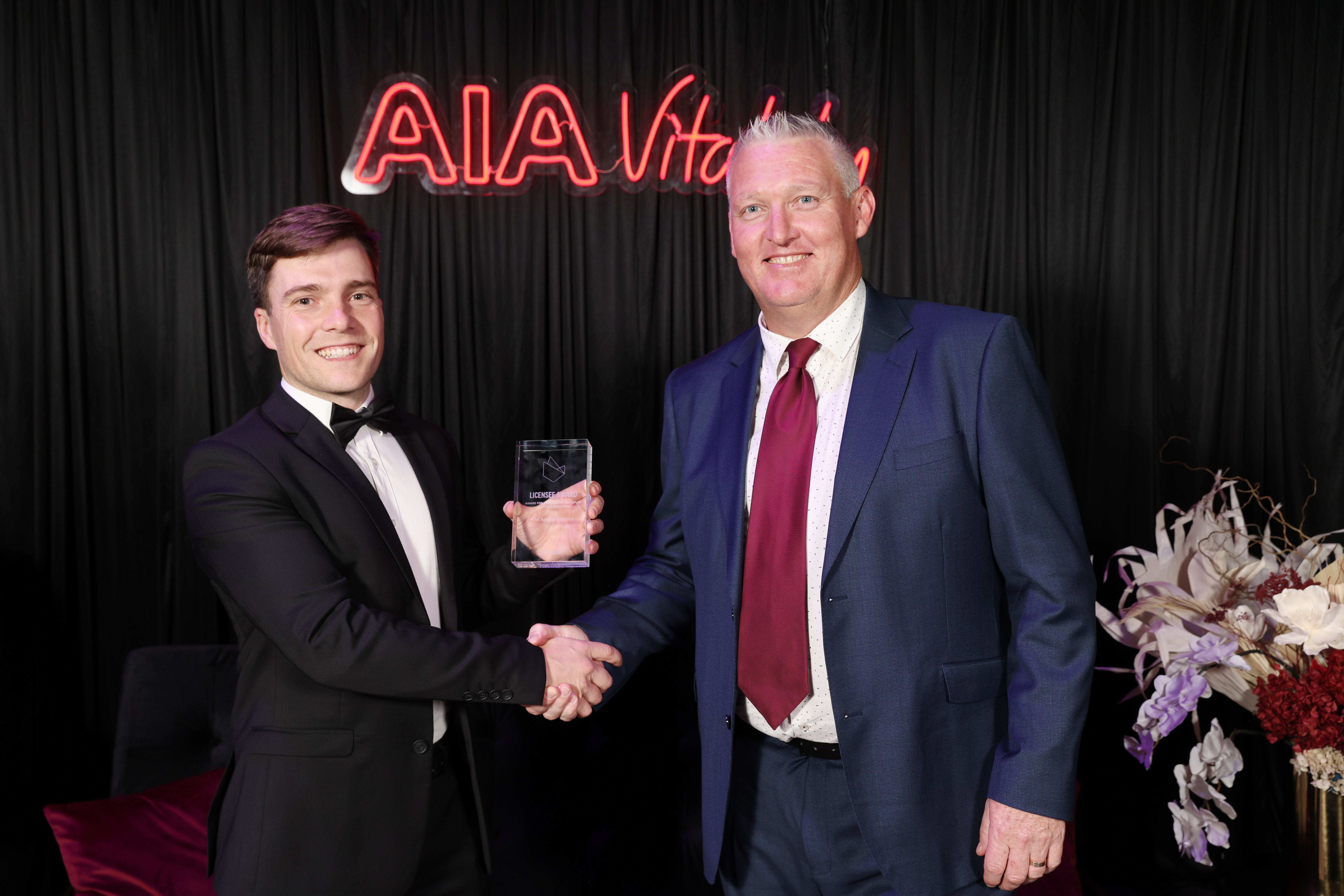 AIA's Ben McQuay presenting the Licensee award for business innovation to The Adviser Platform's Key Account Manager Myles Leacy.