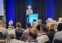 FMA CEO Samantha Barrass addressing attendees at the FSC's Outlook 2024 conference at the Hilton, Auckland.